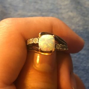 Lab created opal and diamond ring